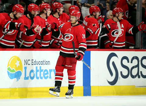 RALEIGH, NC – JANUARY 12: Sebastian Aho #20 of the Carolina Hurricanes celebrates his second period goal against the Washington Capitals during an NHL game on January 12, 2018 at PNC Arena in Raleigh, North Carolina. (Photo by Gregg Forwerck/NHLI via Getty Images)