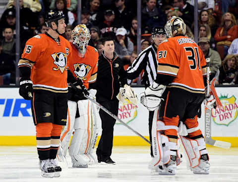 ANAHEIM, CA – JANUARY 06: John Gibson #36 of the Anaheim Ducks leaves the ice as he is replaced after an injury by Frederik Andersen #31 as Ryan Getzlaf #15 of the Anaheim Ducks watches during the third period (Photo by Harry How/Getty Images)