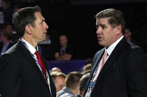 VANCOUVER, BRITISH COLUMBIA – JUNE 22: Head coach Rod Brind’Amour (L) of the Carolina Hurricanes and head coach Peter Laviolette of the Nashville Predators talk on the draft floor during Rounds 2-7 of the 2019 NHL Draft at Rogers Arena on June 22, 2019 in Vancouver, Canada. (Photo by Dave Sandford/NHLI via Getty Images)