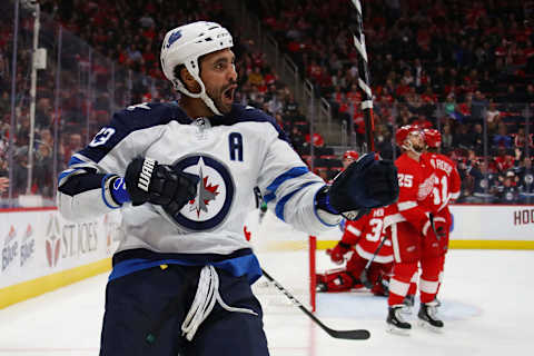 Dustin Byfuglien of the Winnipeg Jets celebrates his third period goal while paying the Detroit Red Wings at Little Caesars Arena on October 26, 2018 in Detroit, Michigan.