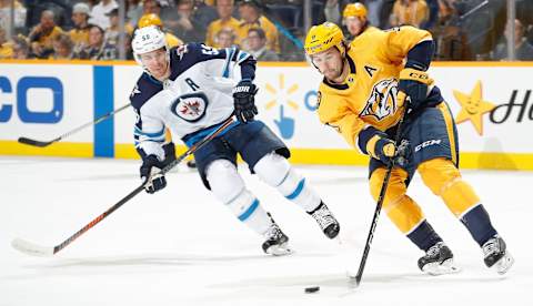 NASHVILLE, TN – OCTOBER 11: Filip Forsberg #9 of the Nashville Predators skates against Mark Scheifele #55 of the Winnipeg Jets at Bridgestone Arena on October 11, 2018 in Nashville, Tennessee. (Photo by John Russell/NHLI via Getty Images)