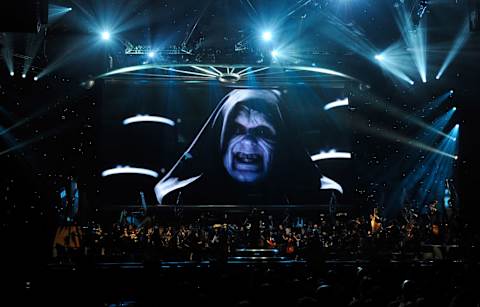 Actor Ian McDiarmid’s Emperor Palpatine character from the Star Wars series of films is shown on screen while musicians perform during “Star Wars: In Concert” at the Orleans Arena May 29, 2010 in Las Vegas, Nevada.