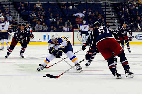 Sep 22, 2015; Columbus, OH, USA; St. Louis Blues defenseman Vince Dunn (29) reaches for the puck against the Columbus Blue Jackets during the third period at Nationwide Arena. Columbus won 3-1. Mandatory Credit: Russell LaBounty-USA TODAY Sports