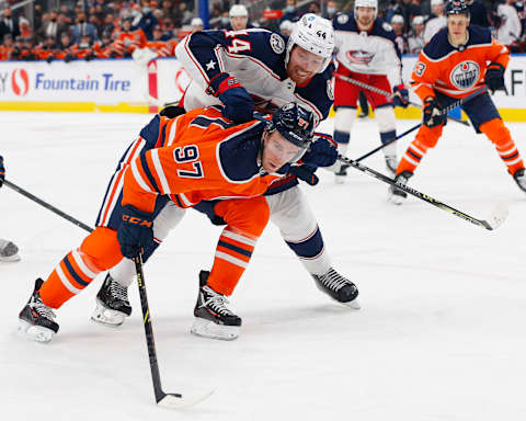 Dec 16, 2021; Edmonton, Alberta, CAN; Columbus Blue Jackets defensemen Vladislav Gavrikov (44) pulls down  t: Perry Nelson-USA TODAY Sports