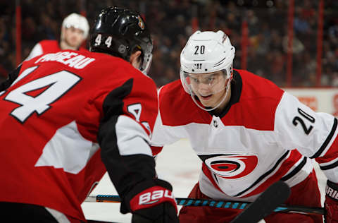 OTTAWA, ON – MARCH 24: Sebastian Aho #20 of the Carolina Hurricanes talks with Jean-Gabriel Pageau #44 of the Ottawa Senators as they prepare for a faceoff at Canadian Tire Centre on March 24, 2018 in Ottawa, Ontario, Canada. (Photo by Andre Ringuette/NHLI via Getty Images)