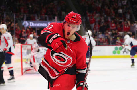 RALEIGH, NC – DECEMBER 28: Carolina Hurricanes left wing Warren Foegele (13) celebrates a goal during the 2nd half of the Carolina Hurricanes game versus the Washington Capitals on December 28th, 2019 at PNC Arena in Raleigh, NC (Photo by Jaylynn Nash/Icon Sportswire via Getty Images)