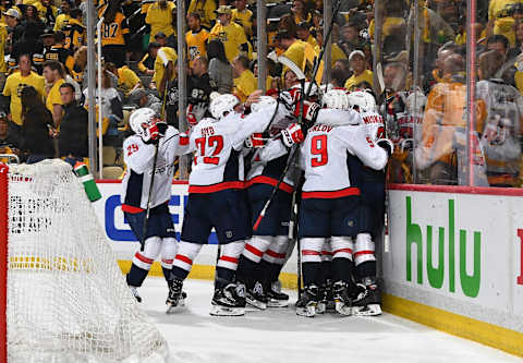 PITTSBURGH, PA – MAY 07: Evgeny Kuznetsov #92 of the Washington Capitals celebrates his overtime goal with teammates against the Pittsburgh Penguins in Game Six of the Eastern Conference Second Round during the 2018 NHL Stanley Cup Playoffs at PPG Paints Arena on May 7, 2018 in Pittsburgh, Pennsylvania. (Photo by Joe Sargent/NHLI via Getty Images)