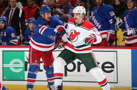 NEWARK, NJ – JANUARY 31: Cody McLeod #8 of the New York Rangers checks Brian Boyle #11 of the New Jersey Devils during the first period at the Prudential Center on January 31, 2019 in Newark, New Jersey. (Photo by Andy Marlin/NHLI via Getty Images)