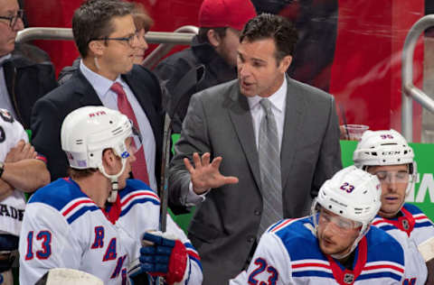 DETROIT, MI – NOVEMBER 09: David Quinn of the New York Rangers talks to Kevin Hayes #13 on the bench against the Detroit Red Wings during an NHL game at Little Caesars Arena on November 9, 2018 in Detroit, Michigan. The Wings defeated the Rangers 3-2 in overtime. (Photo by Dave Reginek/NHLI via Getty Images)