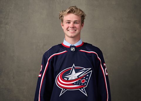 MONTREAL, QUEBEC – JULY 08: James Fisher, #203 pick by the Columbus Blue Jackets, poses for a portrait during the 2022 Upper Deck NHL Draft at Bell Centre on July 08, 2022 in Montreal, Quebec, Canada. (Photo by Minas Panagiotakis/Getty Images)