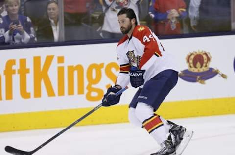 Apr 4, 2016; Toronto, Ontario, CAN; Florida Panthers defenseman Erik Gudbranson (44) moves the puck during the pre game warm up against the Toronto Maple Leafs at Air Canada Centre. Mandatory Credit: John E. Sokolowski-USA TODAY Sports