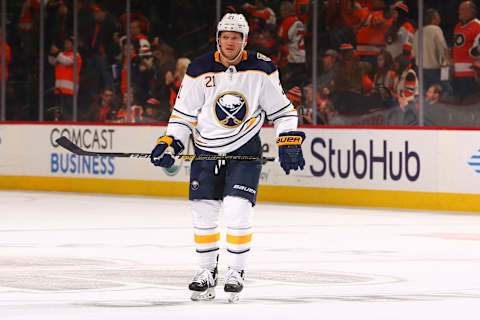 PHILADELPHIA, PA – DECEMBER 19: Kyle Okposo #21 of the Buffalo Sabres looks on against the Philadelphia Flyers at the Wells Fargo Center on December 19, 2019 in Philadelphia, Pennsylvania. (Photo by Mitchell Leff/Getty Images)