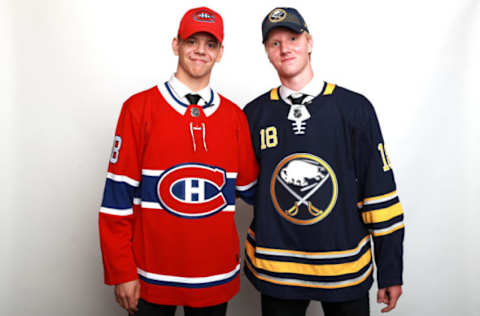 DALLAS, TX – JUNE 22: Rasmus Dahlin (right), who was selected first overall by the Buffalo Sabres, poses with Jesperi Kotkaniemi, who was selected third overall by the Montreal Canadiens, during the first round of the 2018 NHL Draft at American Airlines Center on June 22, 2018 in Dallas, Texas. (Photo by Tom Pennington/Getty Images)