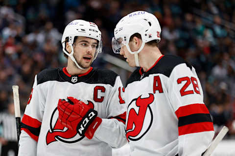 Nico Hischier #13 and Damon Severson #28 of the New Jersey Devils (Photo by Steph Chambers/Getty Images)