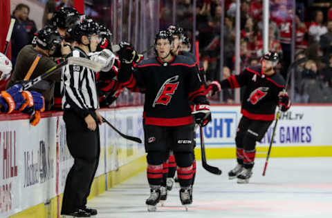 RALEIGH, NC – OCTOBER 11: Carolina Hurricanes Center Erik Haula (56) celebrates a second period goal during an NHL game between the Carolina Hurricanes and the New York Islanders on October 11, 2019 at the PNC Arena in Raleigh, NC. (Photo by John McCreary/Icon Sportswire via Getty Images)