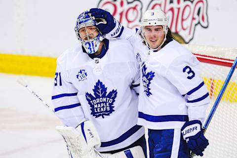 CALGARY, AB – JANUARY 26: Frederik Andersen #31 and Justin Holl #3 of the Toronto Maple Leafs   (Photo by Derek Leung/Getty Images)