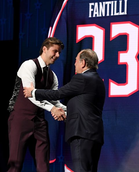 Jun 28, 2023; Nashville, Tennessee, USA; NHL commissioner Gary Bettman congratulates Columbus Blue jackets second overall pick Adam Fantilli during round one of the 2023 NHL Draft at Bridgestone Arena. Mandatory Credit: Christopher Hanewinckel-USA TODAY Sports