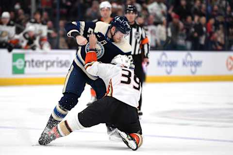 COLUMBUS, OHIO – JANUARY 19: Mathieu Olivier #24 of the Columbus Blue Jackets punches Sam Carrick #39 of the Anaheim Ducks during the first period at Nationwide Arena on January 19, 2023 in Columbus, Ohio. (Photo by Emilee Chinn/Getty Images)