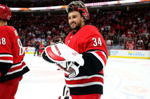 RALEIGH, NC – OCTOBER 3: Petr Mrazek #34 of the Carolina Hurricanes celebrates a victory over the Montreal Canadiens during an NHL game on October 3, 2019 at PNC Arena in Raleigh North Carolina. (Photo by Gregg Forwerck/NHLI via Getty Images)