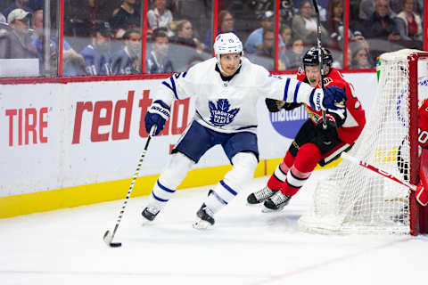 OTTAWA, ON – SEPTEMBER 18: Toronto Maple Leafs center Alexander Kerfoot (15) rounds the net as he fends off Ottawa Senators defenseman Maxence Guenette (50) during third period National Hockey League preseason action between the Toronto Maple Leafs and Ottawa Senators on September 18, 2019, at Canadian Tire Centre in Ottawa, ON, Canada. (Photo by Richard A. Whittaker/Icon Sportswire via Getty Images)