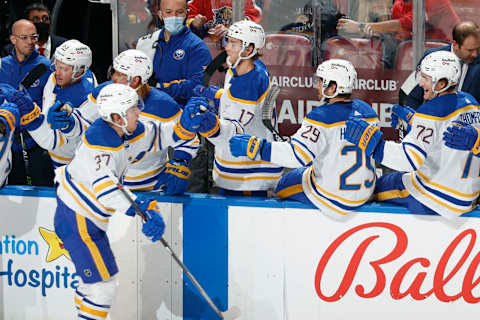 SUNRISE, FL – DECEMBER 2: Teammates congratulate Casey Mittelstadt #37 of the Buffalo Sabres after he scored a second period goal against the Florida Panthers at the FLA Live Arena on December 2, 2021 in Sunrise, Florida. (Photo by Joel Auerbach/Getty Images)