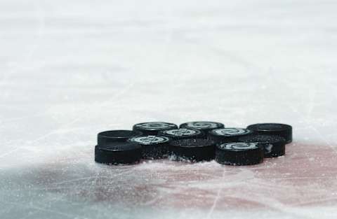 A pile of pucks (Photo by Harry How/Getty Images/NHLI)