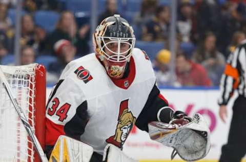 Apr 4, 2019; Buffalo, NY, USA; Ottawa Senators goaltender Joey Daccord (34) defends the goal during the second period against the Buffalo Sabres at KeyBank Center. Mandatory Credit: Timothy T. Ludwig-USA TODAY Sports