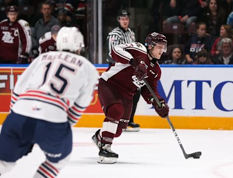 OSHAWA, ON – OCTOBER 20: Mason Mctavish #23 of the Peterborough Petes shoots the puck during an OHL game against the Oshawa Generals at the Tribute Communities Centre on October 20, 2019 in Oshawa, Ontario, Canada. (Photo by Chris Tanouye/Getty Images)