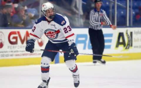 PLYMOUTH, MICHIGAN – JANUARY 17: Lane Hutson #23 of Team White skates up the ice in the first period of the USA Hockey All-American Game at USA Hockey Arena on January 17, 2022 in Plymouth, Michigan. (Photo by Mike Mulholland/Getty Images)