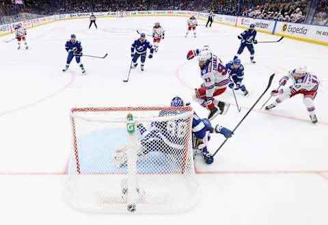 TAMPA, FLORIDA – JUNE 07: Mika Zibanejad #93 of the New York Rangers screens Andrei Vasilevskiy #88 of the Tampa Bay Lightning as a shot comes in Game Four of the Eastern Conference Final during the 2022 Stanley Cup Playoffs at Amalie Arena on June 07, 2022 in Tampa, Florida. (Photo by Bruce Bennett/Getty Images)