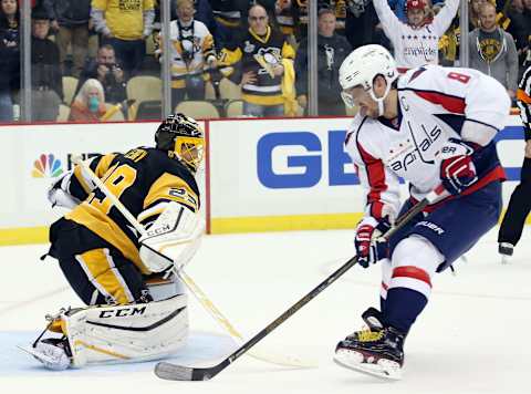 Oct 13, 2016; Pittsburgh, PA, USA; Pittsburgh Penguins goalie Marc-Andre Fleury (29) makes a save against Washington Capitals left wing Alex Ovechkin (8) in the shootout at the PPG Paints Arena. The Penguins won 3-2 in a shootout. Mandatory Credit: Charles LeClaire-USA TODAY Sports