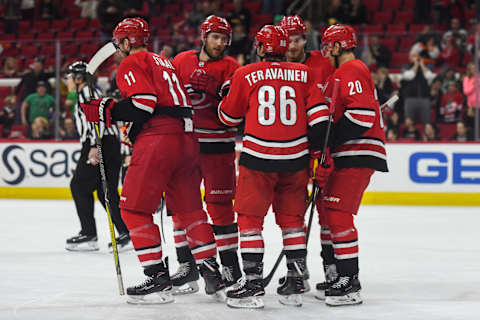 RALEIGH, NC – MARCH 17: Carolina Hurricanes players unite after scoring a goal in the first period during the game between the Philadelphia Flyers and the Carolina Hurricanes on March 17, 2018, at PNC Arena in Raleigh, NC. (Photo by William Howard/Icon Sportswire via Getty Images)