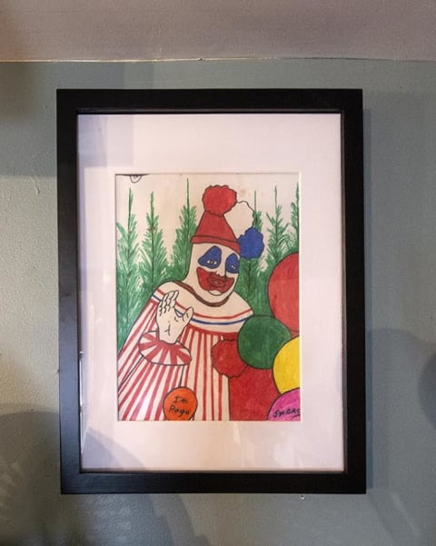 Serial killer John Wayne Gacy used marker to draw this clown portrait, which hangs at Bazaar in Baltimore, Maryland.