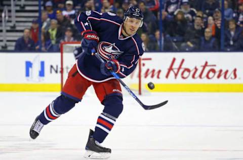 Feb 25, 2017; Columbus, OH, USA; Columbus Blue Jackets defenseman Jack Johnson (7) passes the puck against the New York Islanders in the second period at Nationwide Arena. Mandatory Credit: Aaron Doster-USA TODAY Sports