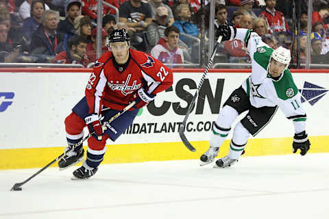 Mar 6, 2017; Washington, DC, USA; Washington Capitals defenseman Kevin Shattenkirk (22) skates with the puck past Dallas Stars left wing Curtis McKenzie (11) in the second period at Verizon Center. The Stars won 4-2. Mandatory Credit: Geoff Burke-USA TODAY Sports