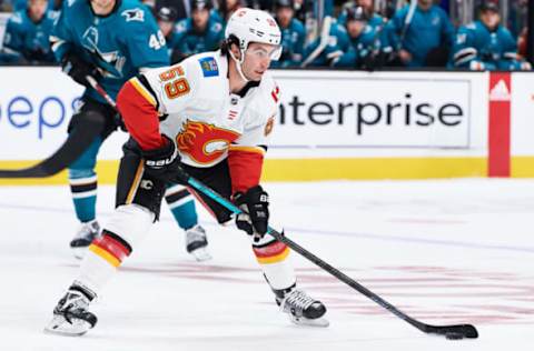 SAN JOSE, CA – SEPTEMBER 27: Calgary Flames center Dillon Dube (59) carries the puck during the San Jose Sharks game versus the Calgary Flames on September 27, 2018, at SAP Center at San Jose in San Jose, CA. (Photo by Matt Cohen/Icon Sportswire via Getty Images)