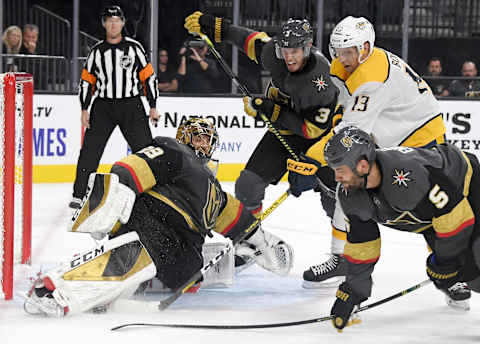 LAS VEGAS, NEVADA – OCTOBER 15: Marc-Andre Fleury #29 of the Vegas Golden Knights blocks a shot by Nick Bonino #13 of the Nashville Predators as Brayden McNabb #3 and Deryk Engelland #5 of the Golden Knights defend in the third period of their game at T-Mobile Arena on October 15, 2019 in Las Vegas, Nevada. The Predators defeated the Golden Knights 5-2. (Photo by Ethan Miller/Getty Images)