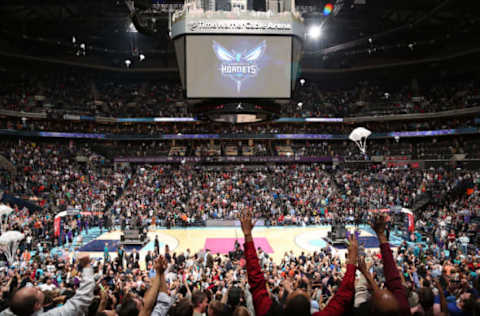 CHARLOTTE, NC – DECEMBER 21: Michael Jordan, Owner of the Charlotte Bobcats unveils the new Charlotte Hornets logo during the game against the Utah Jazz at the Time Warner Cable Arena on December 21, 2013 in Charlotte, North Carolina. NOTE TO USER: User expressly acknowledges and agrees that, by downloading and or using this photograph, User is consenting to the terms and conditions of the Getty Images License Agreement. Mandatory Copyright Notice: Copyright 2013 NBAE (Photo by Brock Williams-Smith/NBAE via Getty Images)