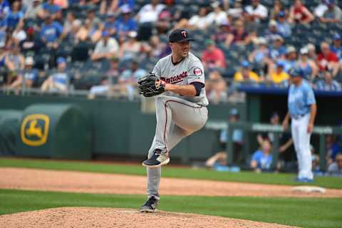 Parker joins the demoted Eflin in the pen. Photo by Ed Zurga/Getty Images.