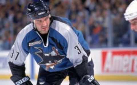 20 Nov 1999: Stephane Matteau #37of the San Jose Sharks eyes his opponent during a game against the St. Louis Blues at the Kiel Center in St. Louis, Missouri. The Sharks tied the Blues 1-1 in overtime. Mandatory Credit: Elsa Hasch /Allsport