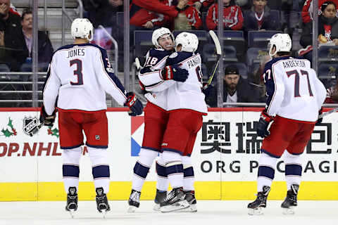 Pierre-Luc Dubois #18 of the Columbus Blue Jackets and Artemi Panarin #9. (Photo by Rob Carr/Getty Images)