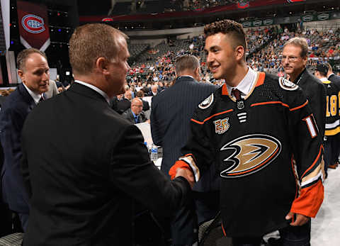 DALLAS, TX – JUNE 23: Benoit-Olivier Groulx greets his team after being selected 54th overall by the Anaheim Ducks during the 2018 NHL Draft at American Airlines Center on June 23, 2018, in Dallas, Texas. (Photo by Brian Babineau/NHLI via Getty Images)