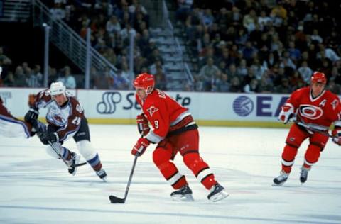 3 Nov 2000: Sandis Ozolinsh #8 of the Carolina Hurricanes inmoves with the puck during the game against the Colorado Avalanche at the Pepsi Center in Denver, Colorado. THe Avalanche defeated the Hurricanes 5-3.Mandatory Credit: Jon Ferrey /Allsport