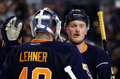 NHL Power Rankings: Buffalo Sabres center Jack Eichel (15) congratulates goalie Robin Lehner (40) for recording a shutout against the Ottawa Senators at KeyBank Center. Sabres beat the Senators 4-0. Mandatory Credit: Kevin Hoffman-USA TODAY Sports