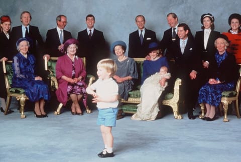 Young Prince William entertains the royal relatives and godparents who gathered at Windsor Castle on December 21, 1984 for the christening of Prince Harry.