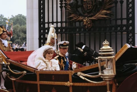 Diana, Princess of Wales and Prince Charles ride in a carriage after their wedding at London's St. Paul's Cathedral on July 29, 1981.