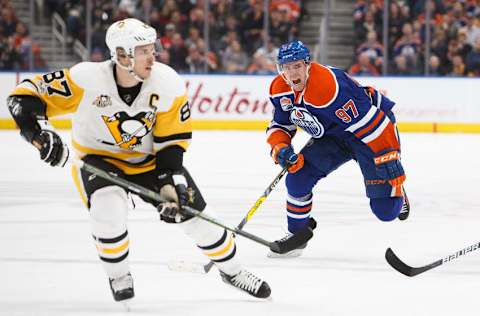 EDMONTON, AB - MARCH 10: Connor McDavid #97 of the Edmonton Oilers pursues Sidney Crosby #87 of the Pittsburgh Penguins on March 10, 2017 at Rogers Place in Edmonton, Alberta, Canada. (Photo by Codie McLachlan/Getty Images)