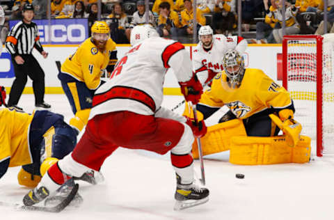 NASHVILLE, TENNESSEE – MAY 27: Juuse Saros #74 of the Nashville Predators makes a save on a shot by Teuvo Teravainen #86 of the Carolina Hurricanes during the second period in Game Six of the First Round of the 2021 Stanley Cup Playoffs at Bridgestone Arena on May 27, 2021, in Nashville, Tennessee. (Photo by Frederick Breedon/Getty Images)