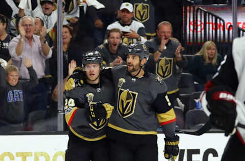 LAS VEGAS, NV – OCTOBER 10: Oscar Lindberg #24 of the Vegas Golden Knights celebrates his goal at 17:22 of the second period and is joined by Deryk Engelland #5 against the Arizona Coyotes during the Golden Knights’ inaugural regular-season home opener at T-Mobile Arena on October 10, 2017 in Las Vegas, Nevada. (Photo by Bruce Bennett/Getty Images)