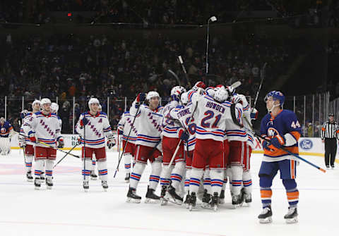 NEW YORK, NEW YORK – FEBRUARY 25: The New York Rangers celebrate their 4-3 overtime win against the New York Islanders at NYCB Live’s Nassau Coliseum on February 25, 2020 in Uniondale, New York. (Photo by Bruce Bennett/Getty Images)